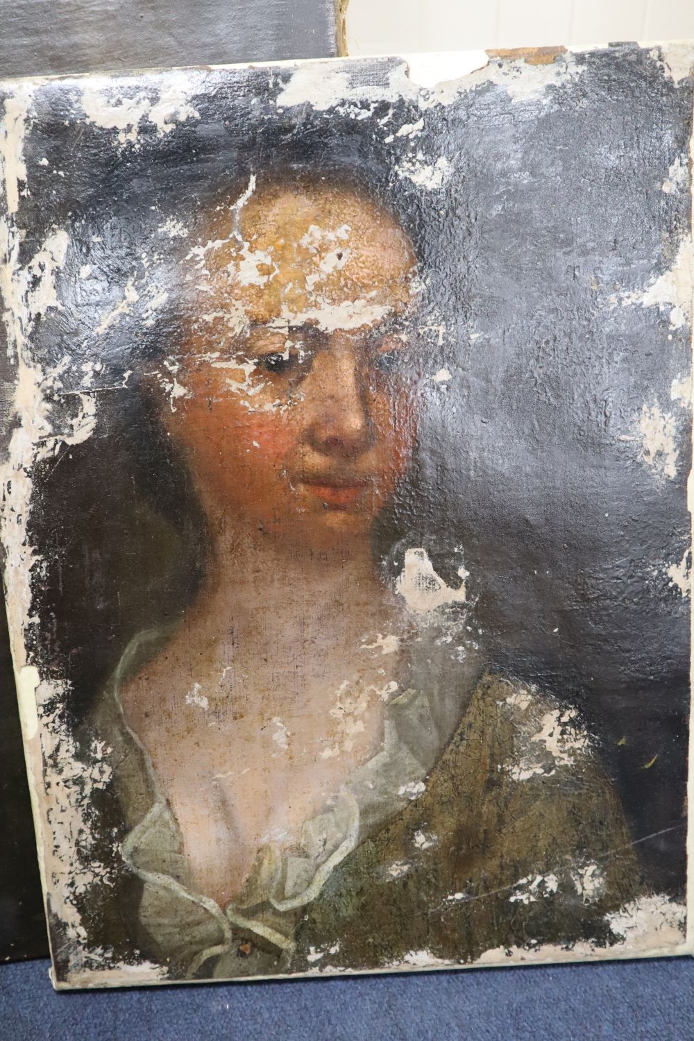 Victorian School, oil on canvas, Portrait of a gentleman, 76 x 63cm and an earlier distressed oil portrait of a lady, 48 x 37cm, both u